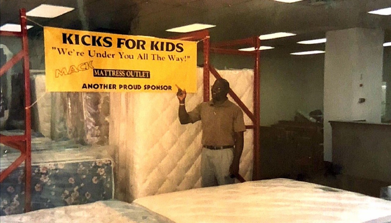 Mack Mattress Outlet sponsorship signage for Kicks for Kids