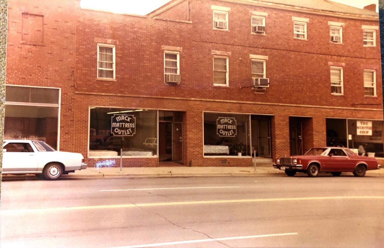An early Mack Mattress storefront