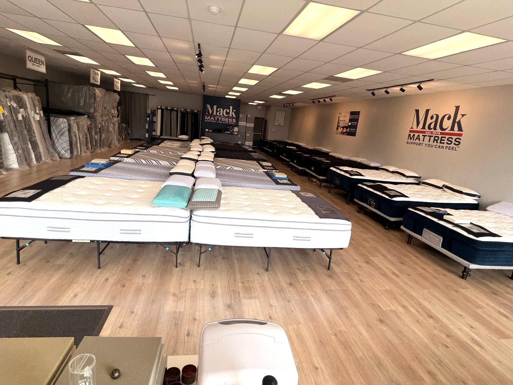 Pillows and mattresses in the real Mack Mattress Sawmill Road showroom